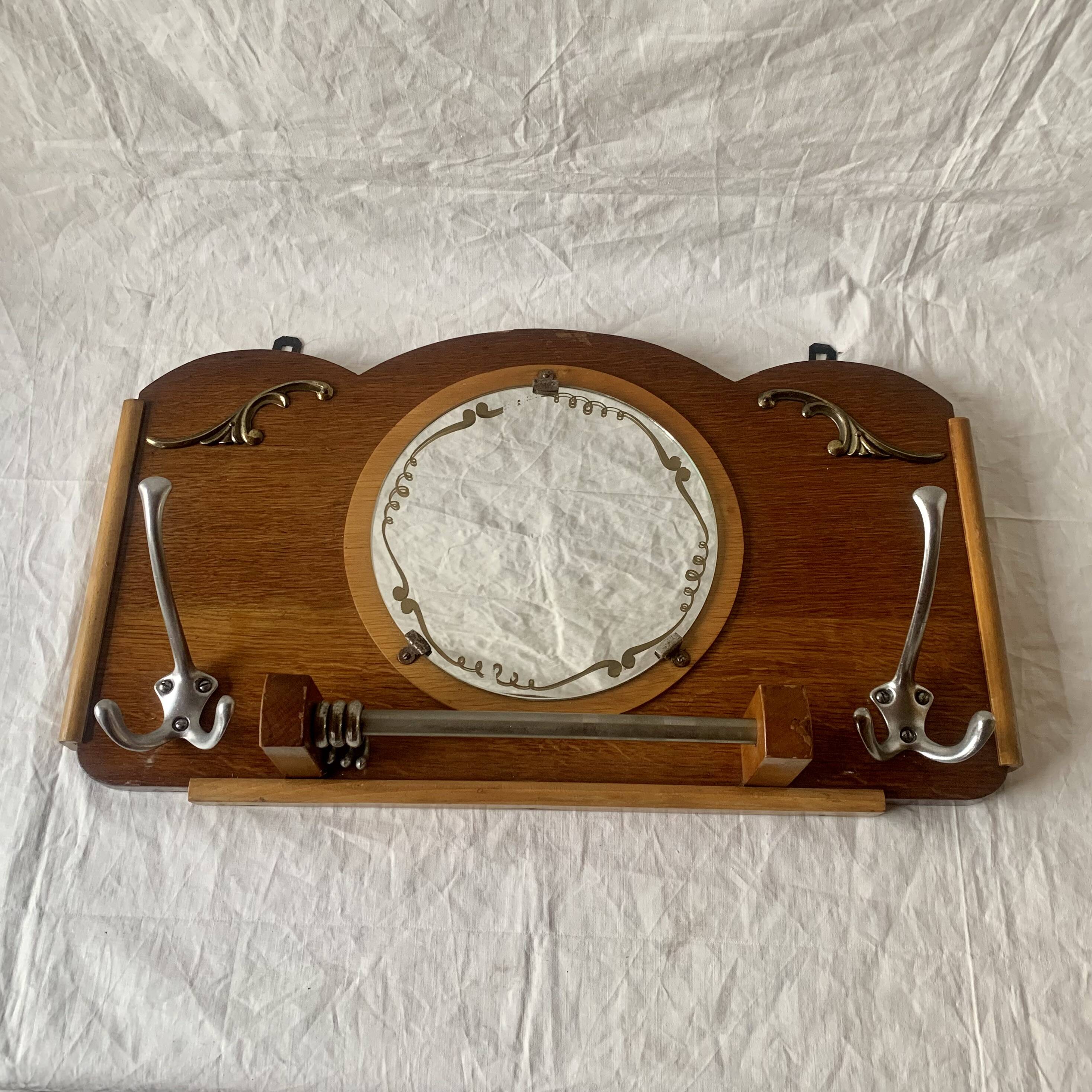 Art Deco wooden wall coat rack with round central mirror