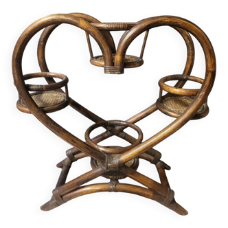 Authentic vintage wicker rattan plant stand planter.