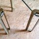 Glass and brass coffee tables by Peter Ghyczy