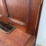 Antique wooden coat rack with mirror and shelf.