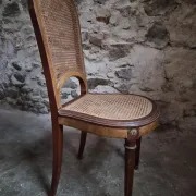 Set of 6 antique Louis XVI style dining chairs with caning.