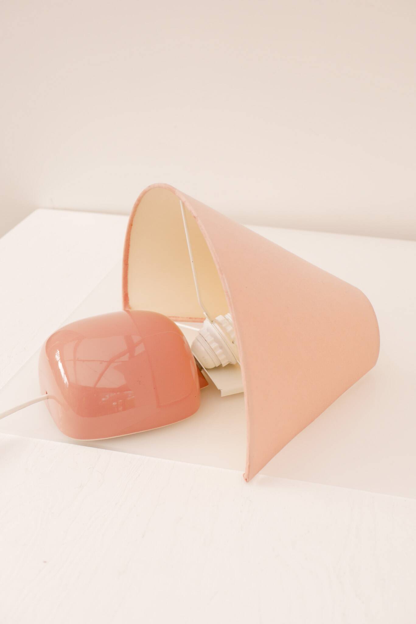 Vintage IKEA 80s sconce. A wall mounted lamp classic semi-round in pink