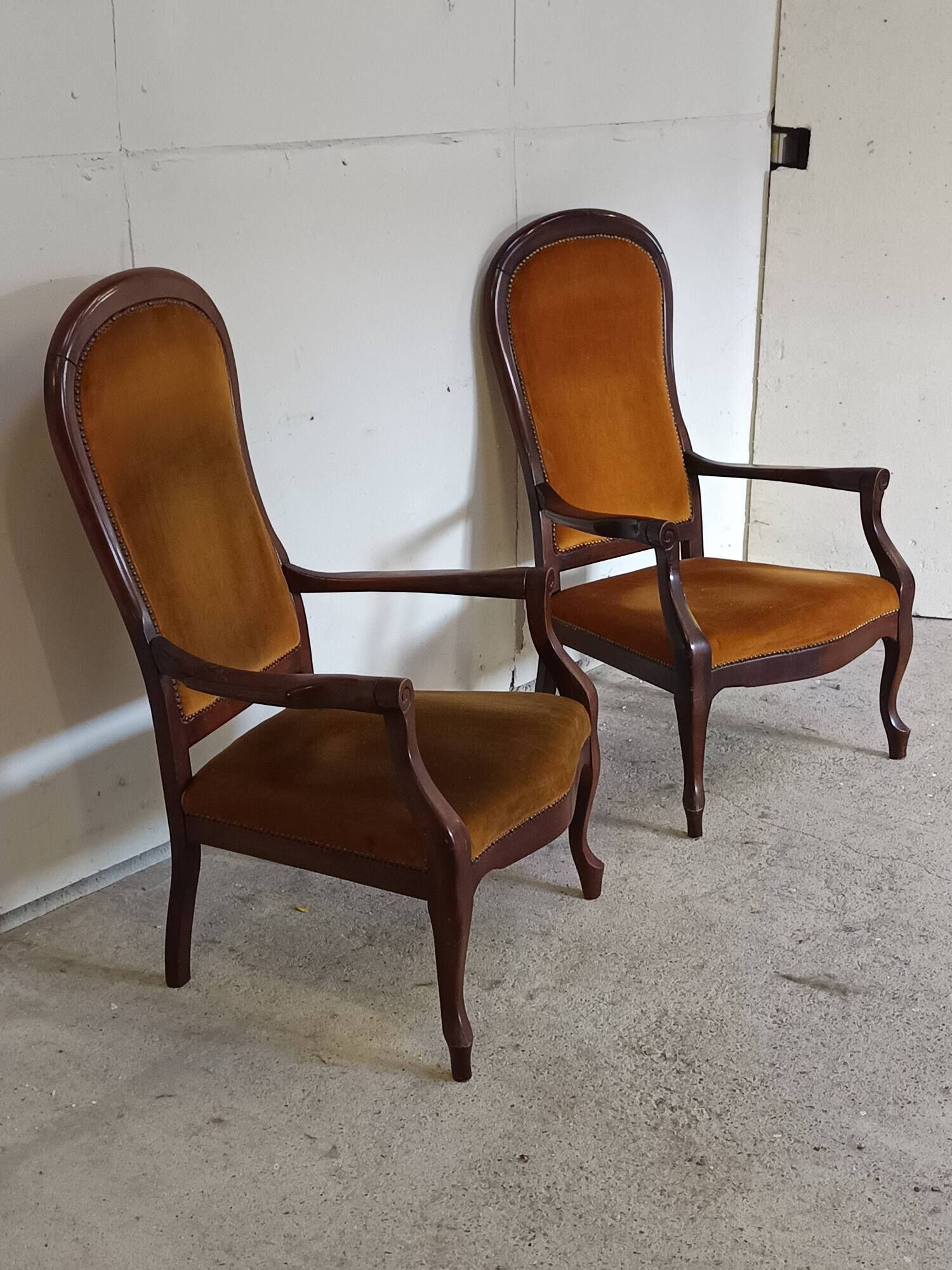 pair of Voltaire armchairs