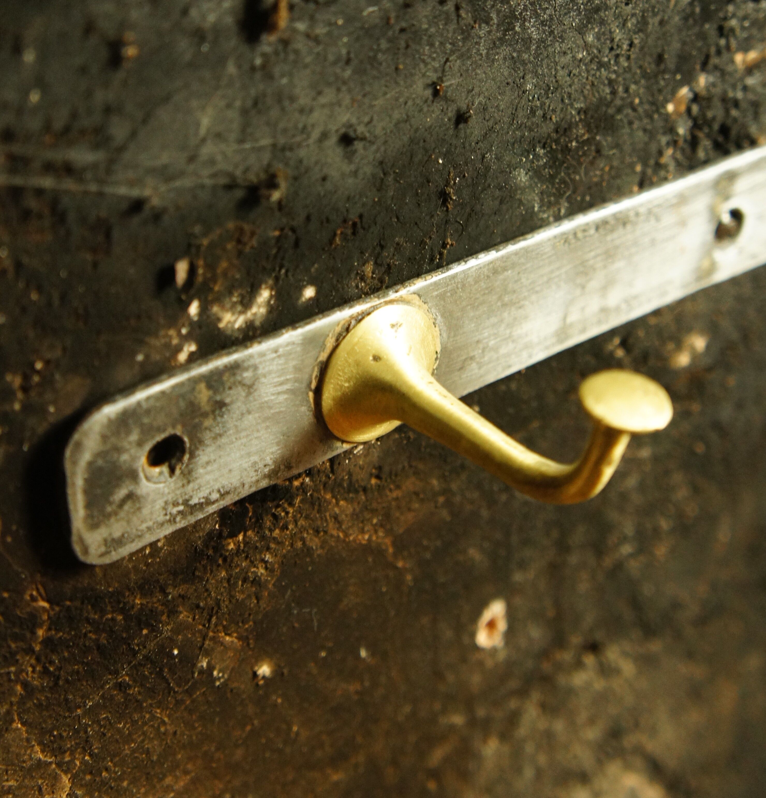 Golden bronze and black steel