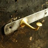 Golden bronze and black steel