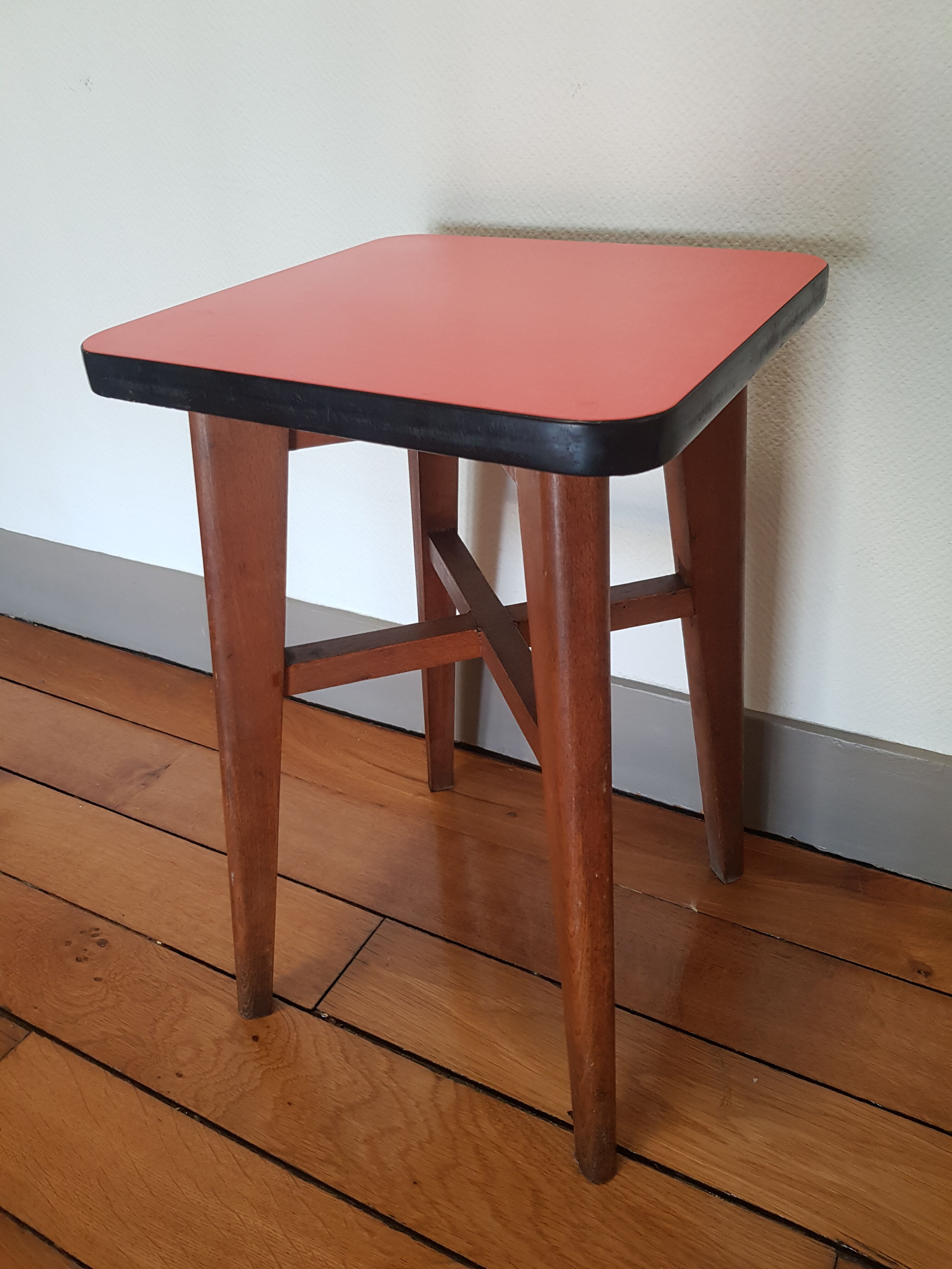 Wooden and red formica stool