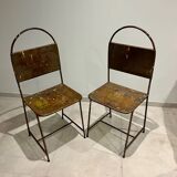 Pair of vintage raw metal chairs