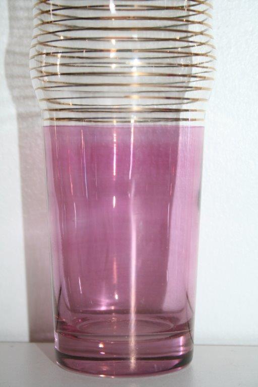 Service has lemonade pitcher and 7 glasses glass