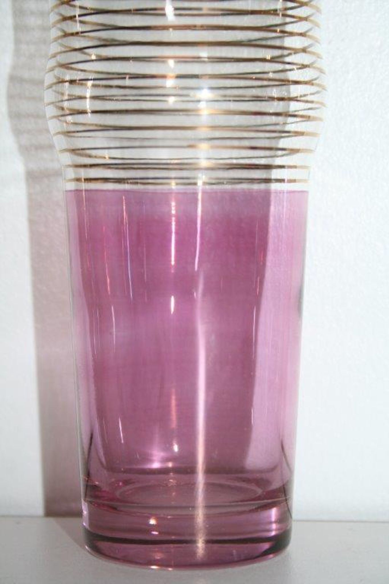 Service has lemonade pitcher and 7 glasses glass