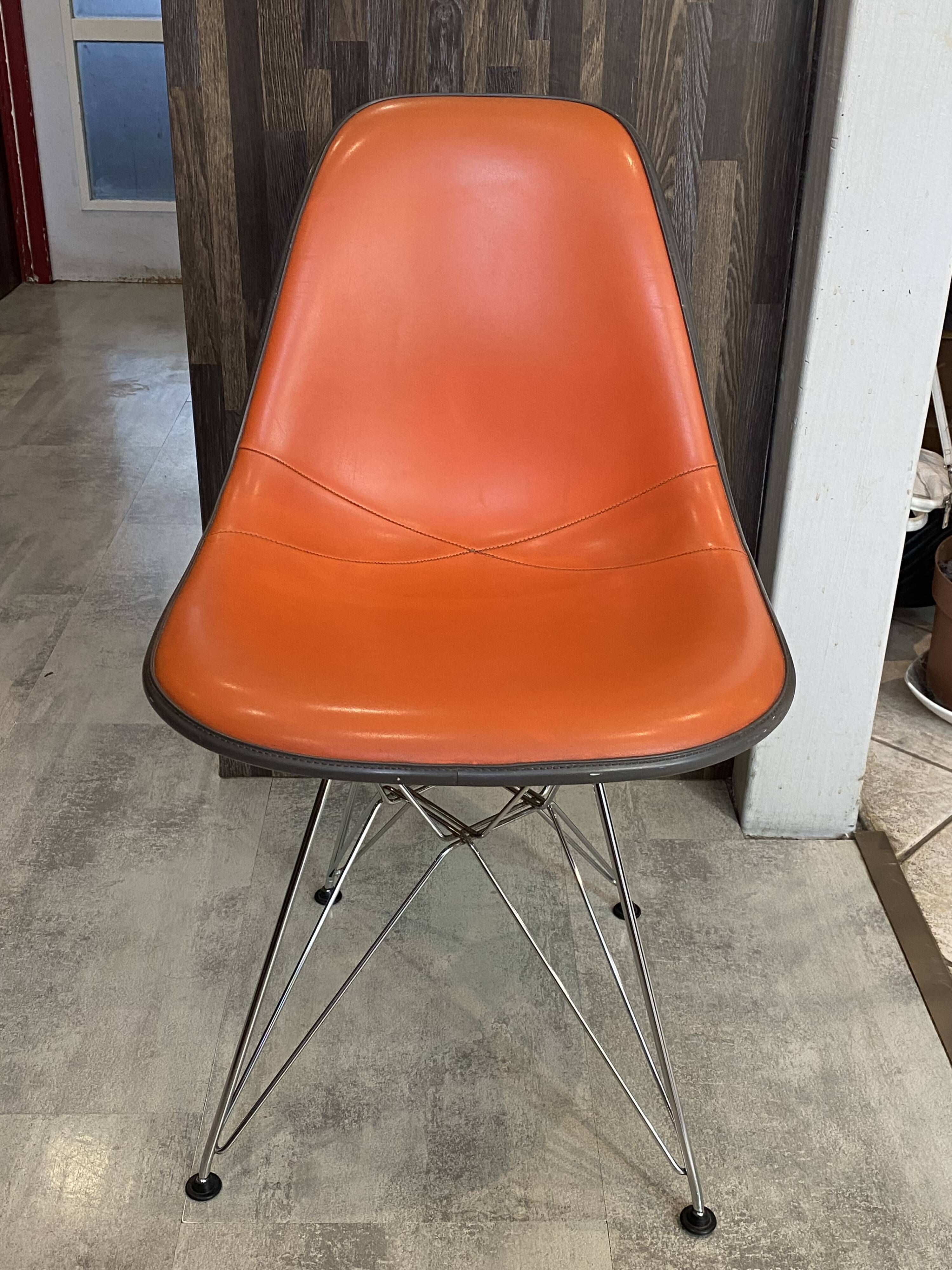 Eames Herman Miller DSR Eiffel chair in orange greige fibreglass and skai.