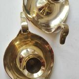 Pair of hand candle holders/Cellar rats shape swans, in polished brass. 1950s