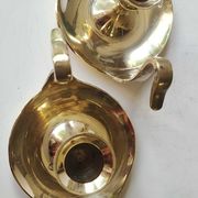 Pair of hand candle holders/Cellar rats shape swans, in polished brass. 1950s