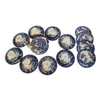 Japanese tea service with cherry blossom decoration in fine porcelain.