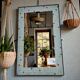 Vintage wall mirror in mint blue mosaic