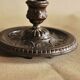 Bronze cellar rat hand candle holder