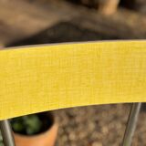 Pair of yellow Formica chairs