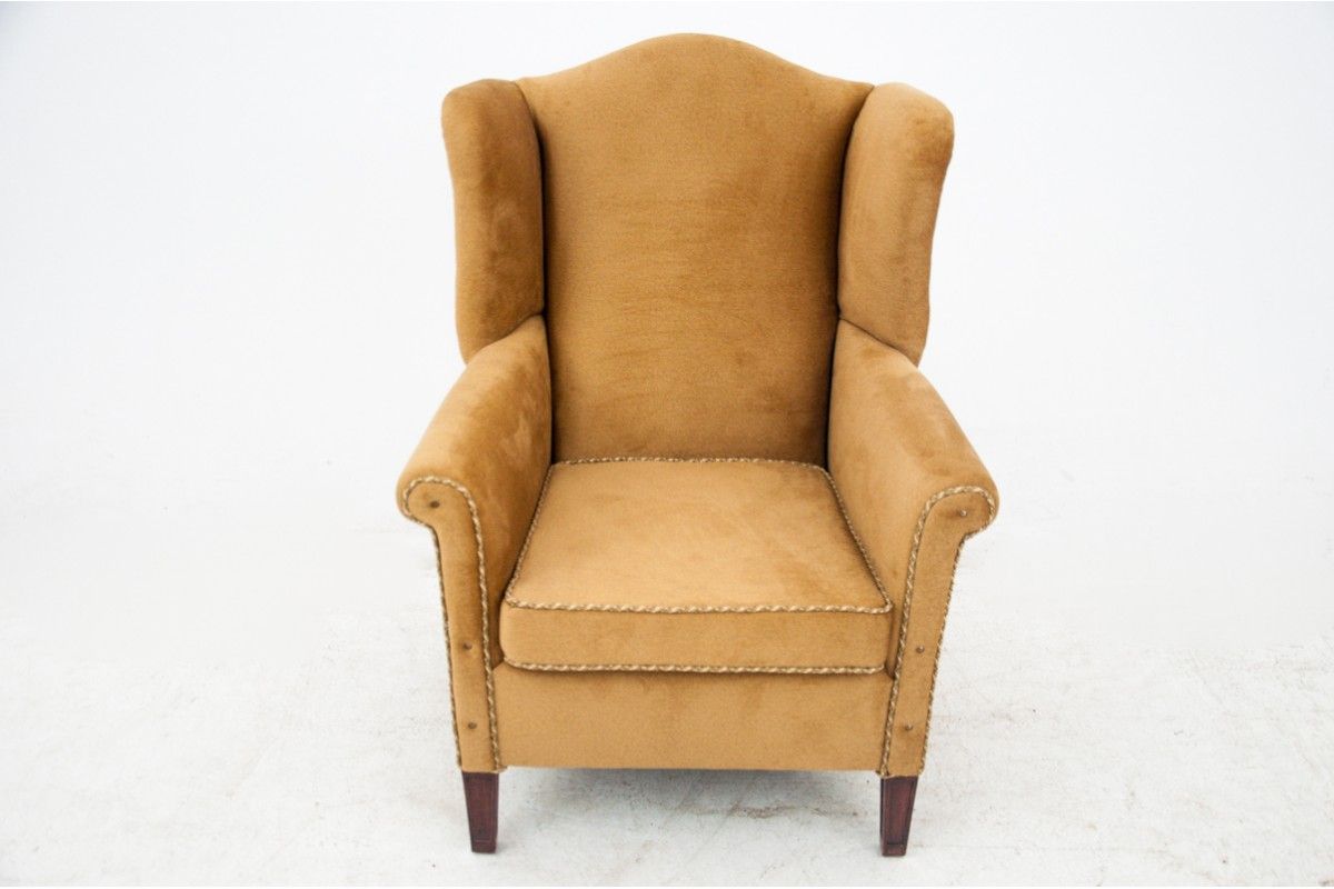 Yellow wingback armchair, Northern Europe, circa 1940s