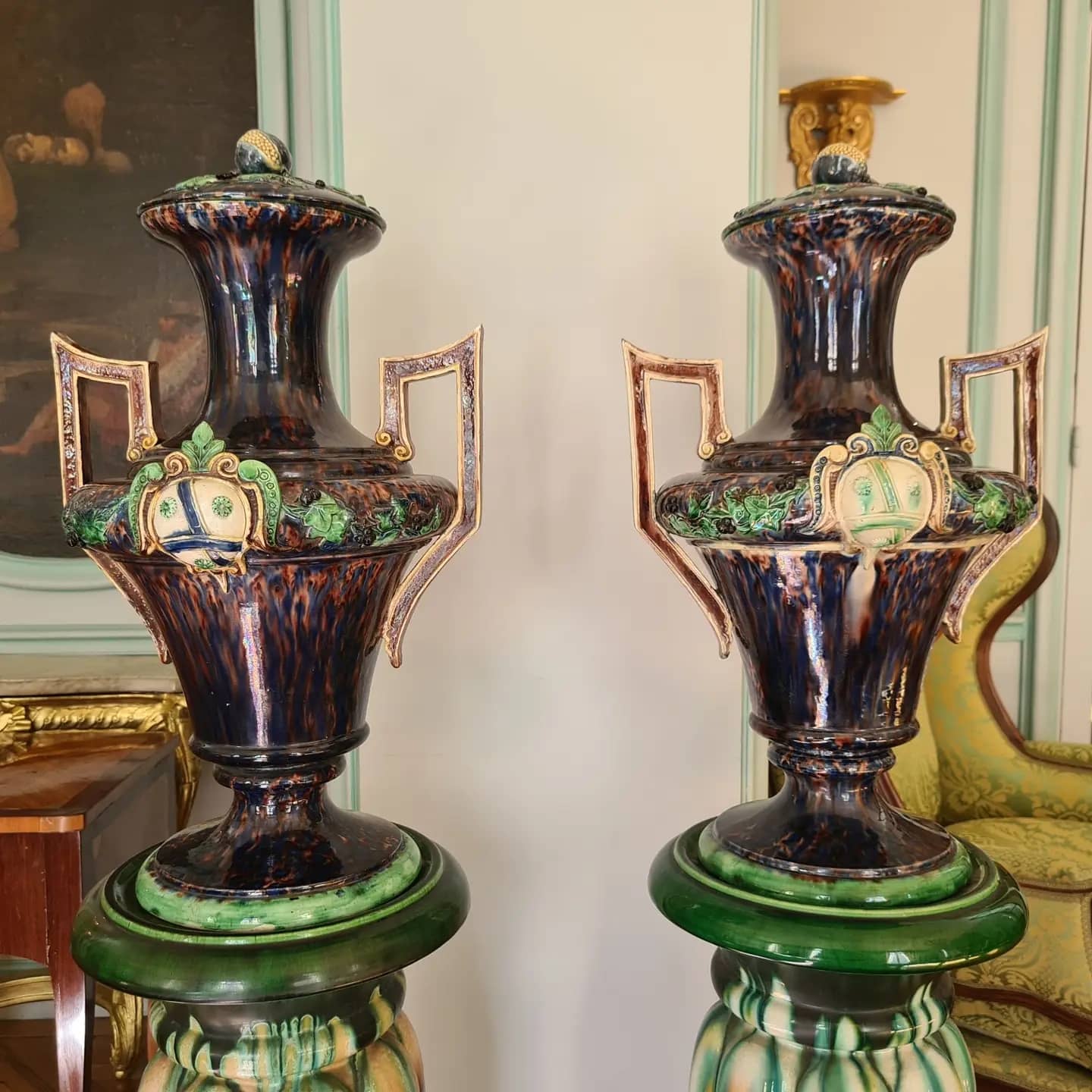 Large pair of polychrome earthenware vases, circa 1860.