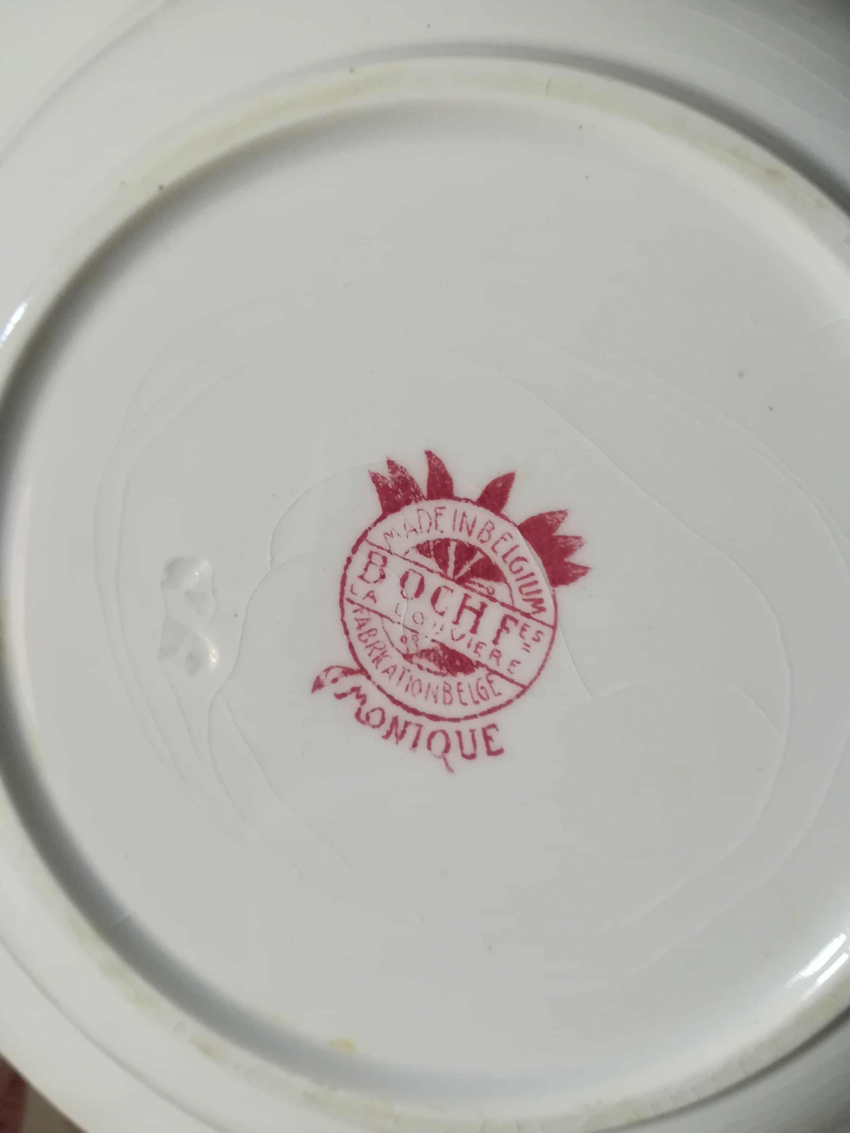 Set of 6 hollow iron earth plates by Boch