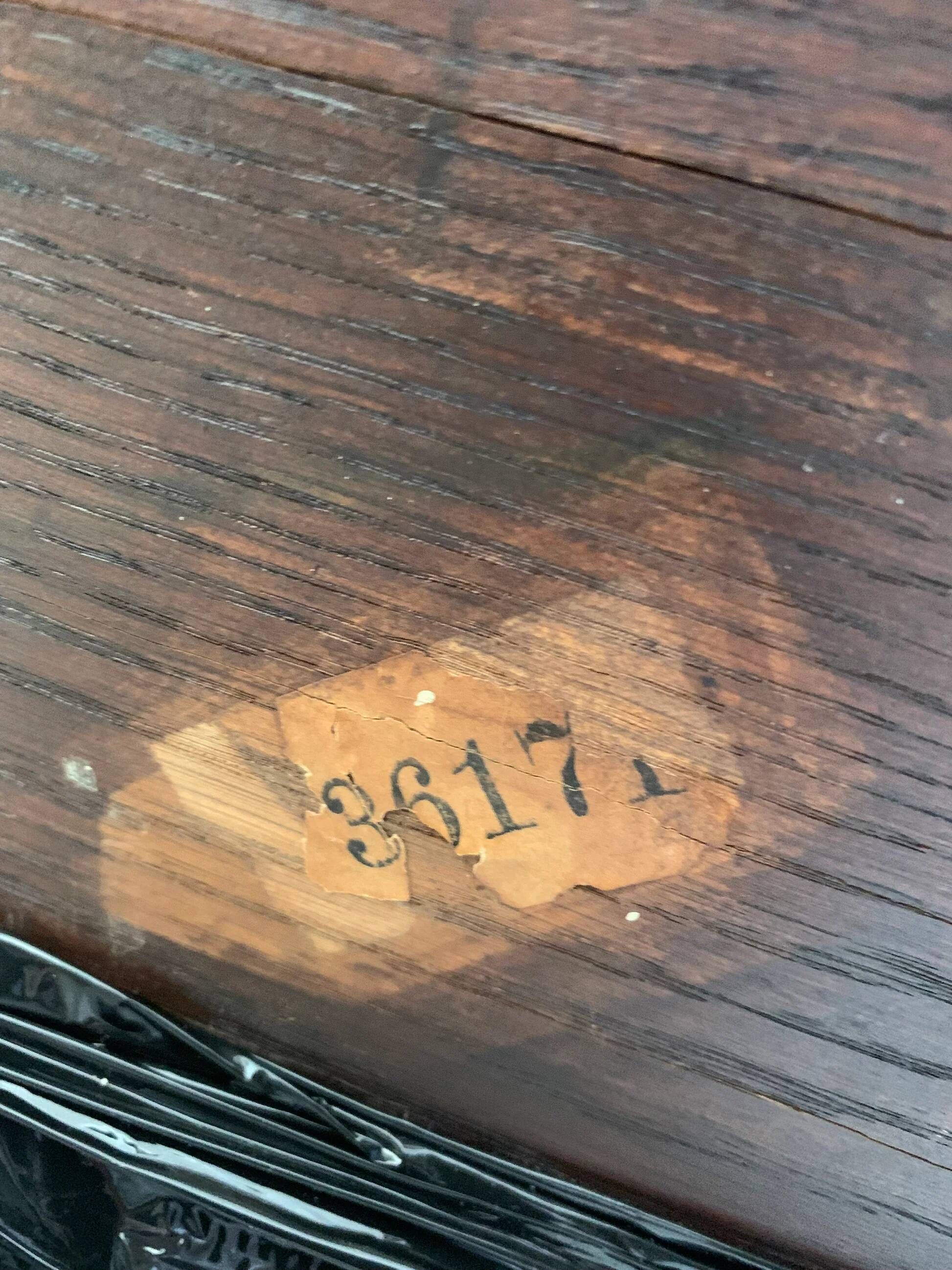 Octagonal oak table, 19th century, with griffins.