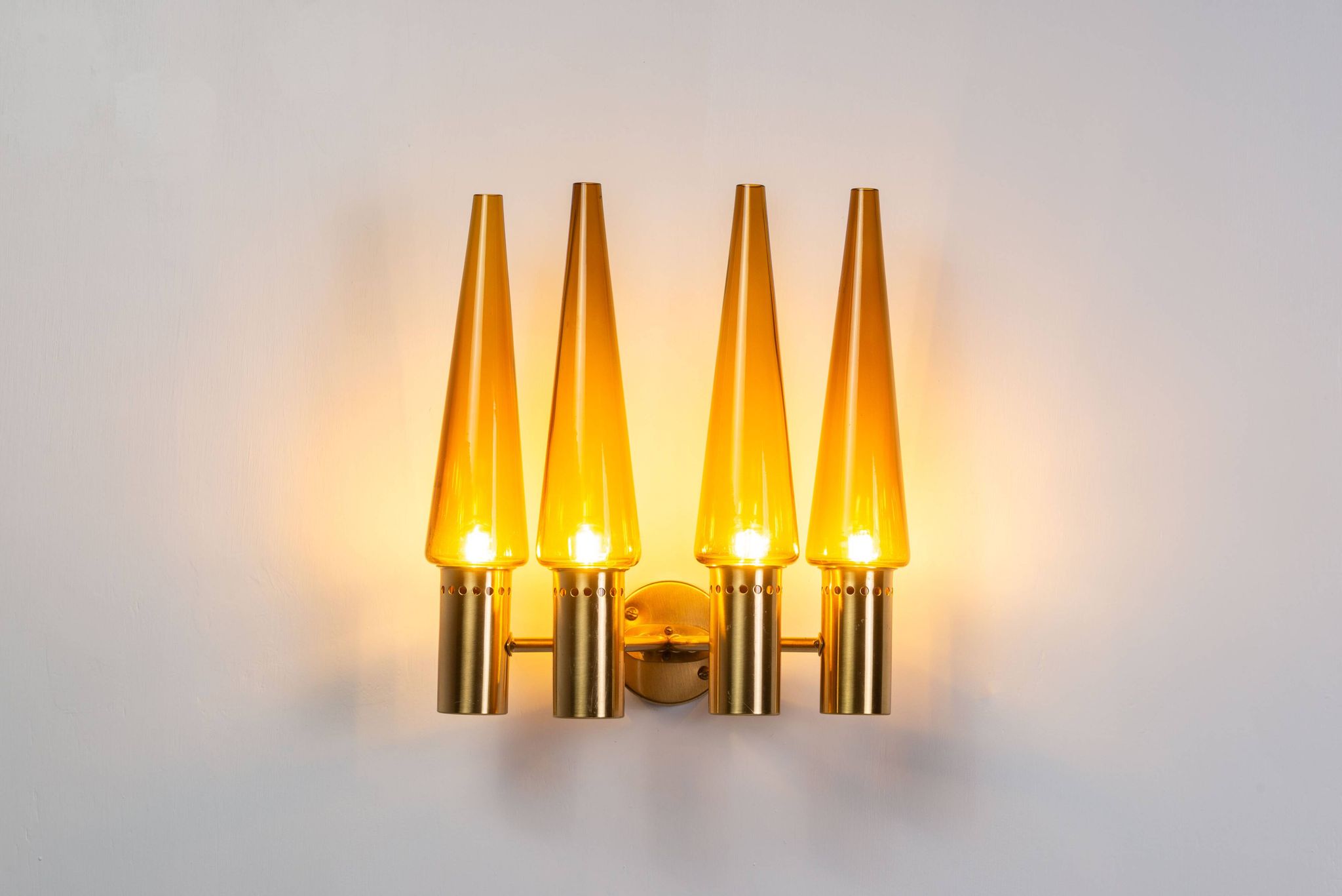 Hans Agne Jakobsson wall lamp made from brass with orange shades