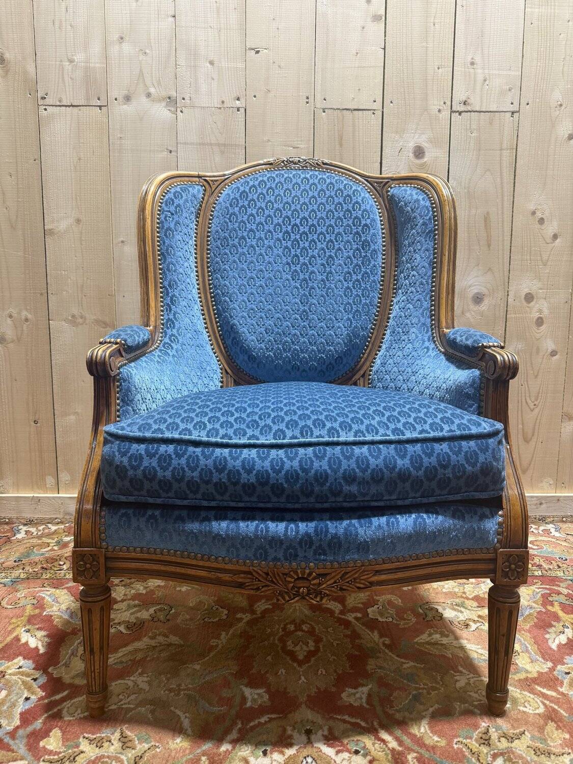 Louis XVI style blue velvet wingback armchair