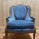 Louis XVI style blue velvet wingback armchair