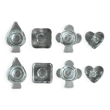 2 sets of heart-shaped clover and diamond candlesticks.