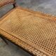 Wooden and cane bench (piano bench)