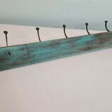 Wooden school coat rack with cast iron hooks