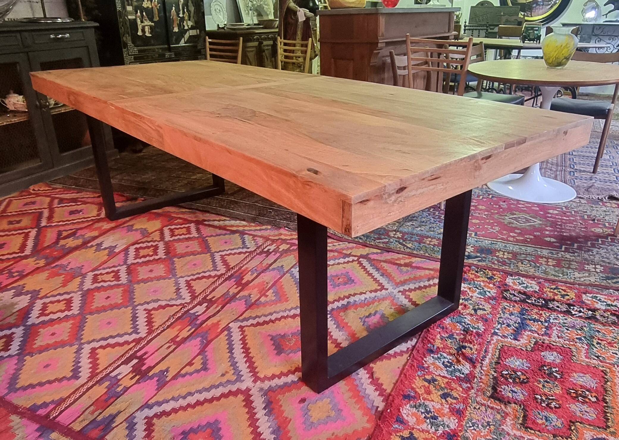 Large mango wood table with contemporary base