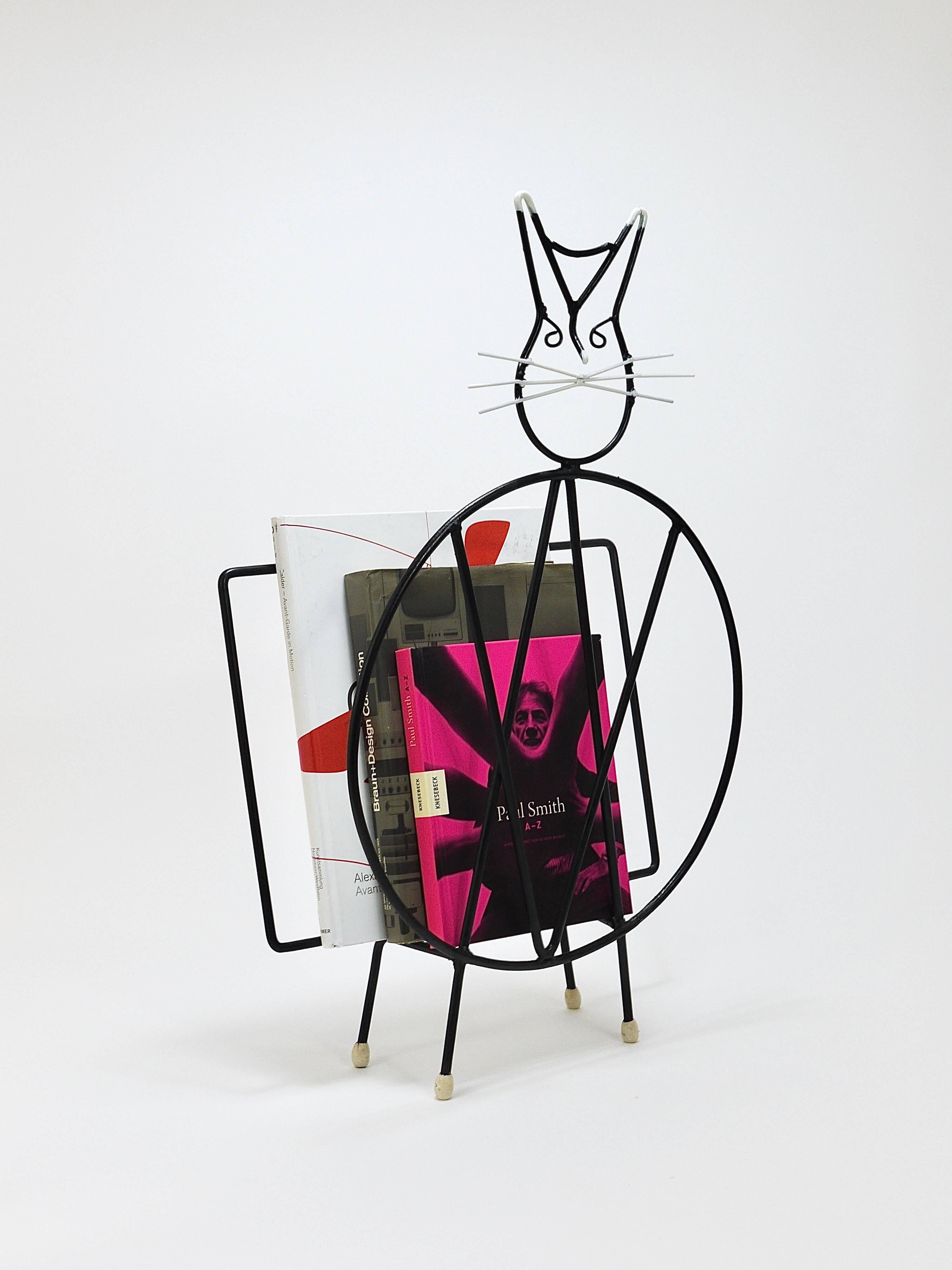 Mid-century cat-shaped magazine or record holder, iron, Italy, 1950s.