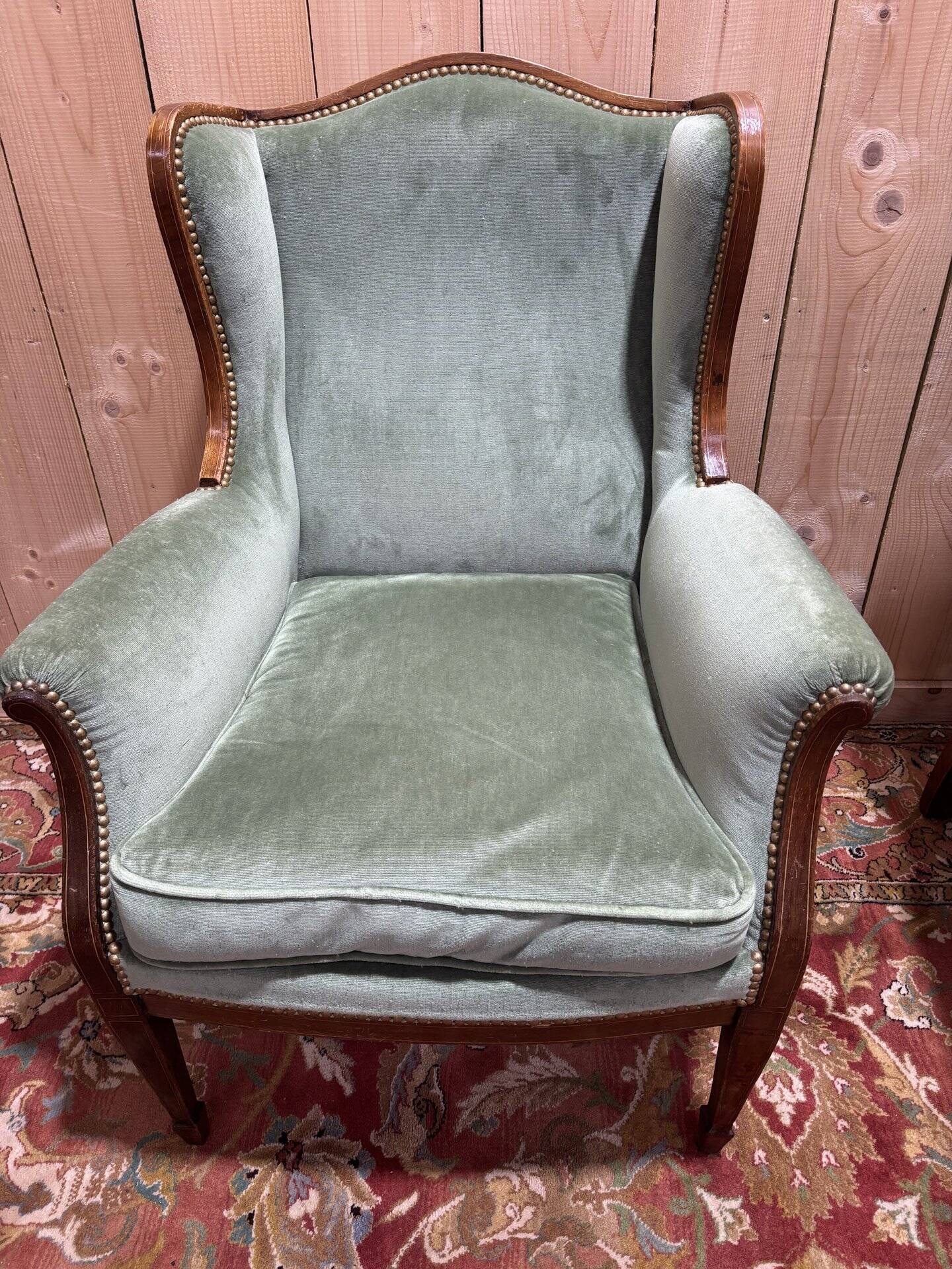 Pair of Louis XVI style wingback armchairs