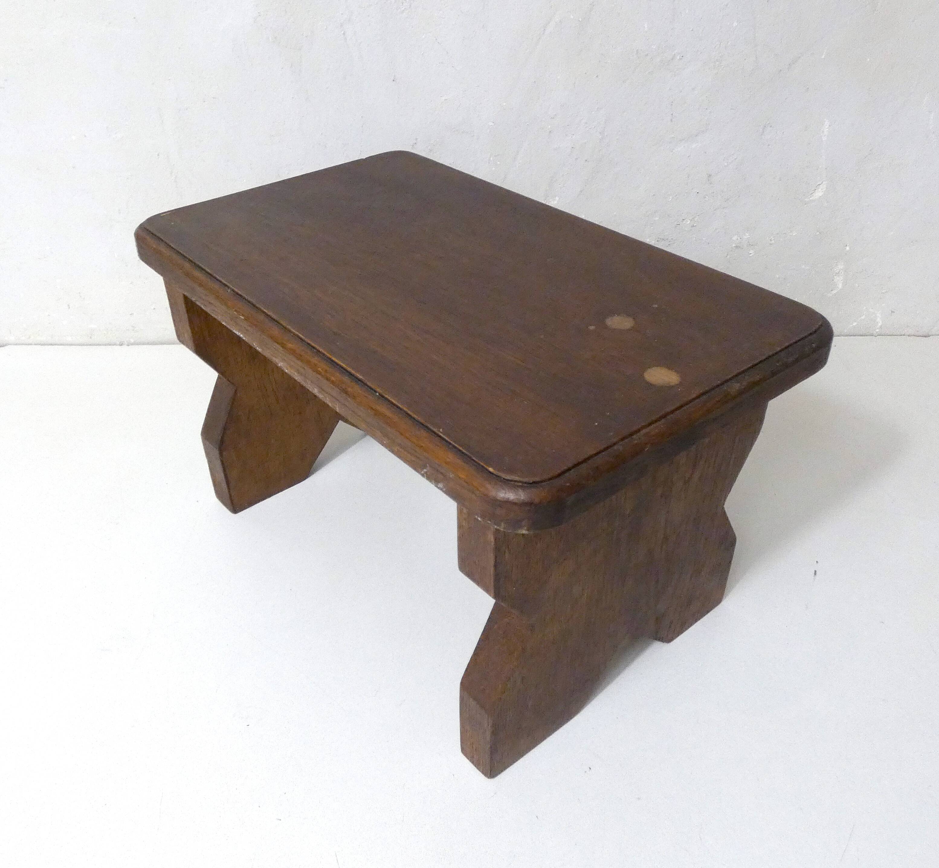 Old small bench in solid oak wood vintage step stool