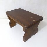 Old small bench in solid oak wood vintage step stool