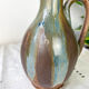 Art Nouveau style carafe in flamed stoneware with blue and brown drips