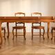 Dining table set with 6 chairs in cherry wood.