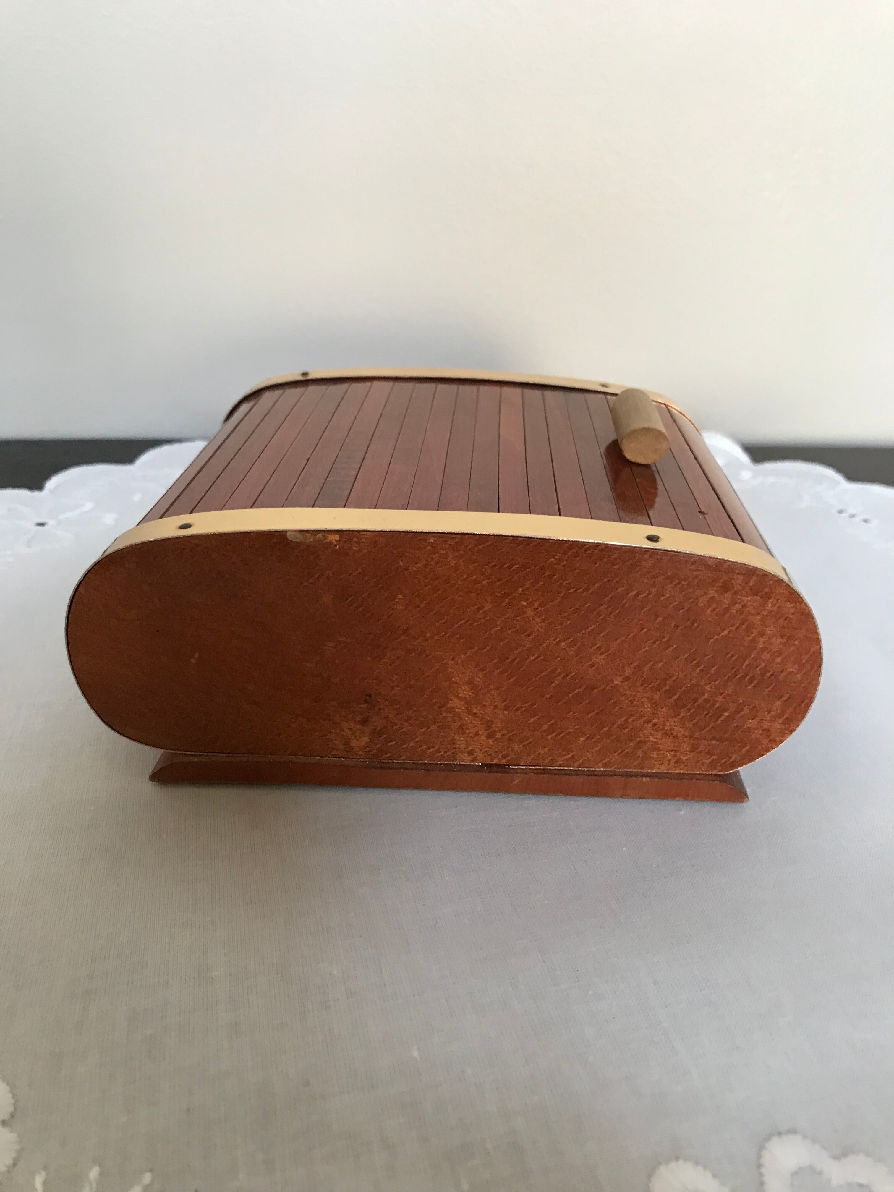 Vintage wooden cigarette box and brass curtain sliding lid