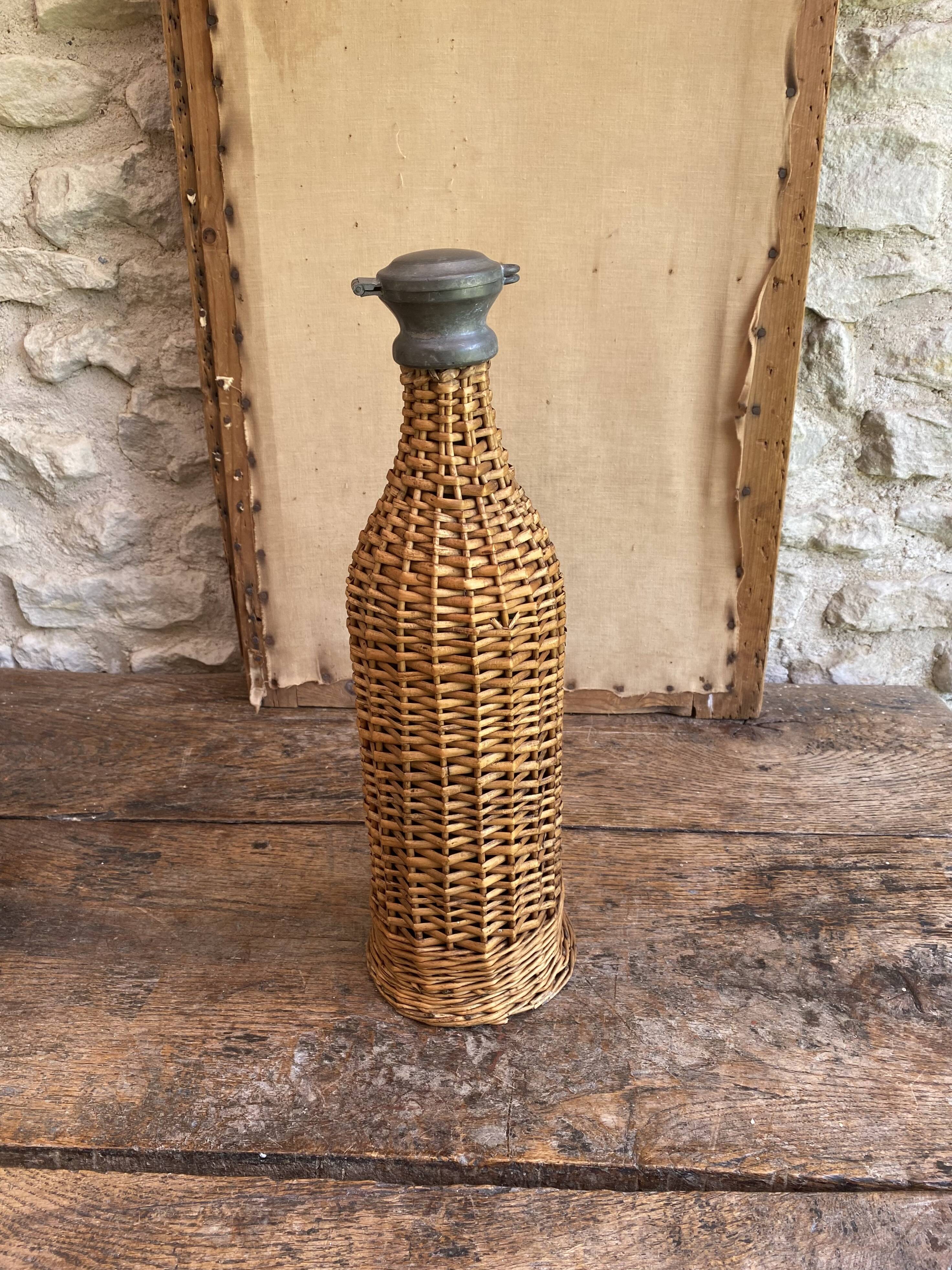Woven wicker bottle