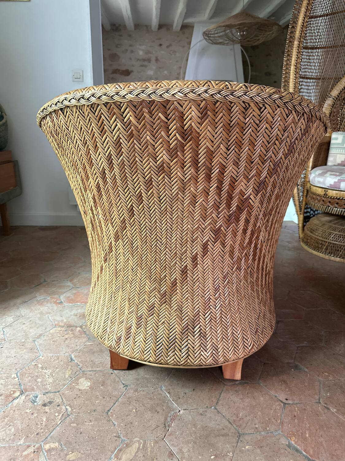 Varnished rattan armchair