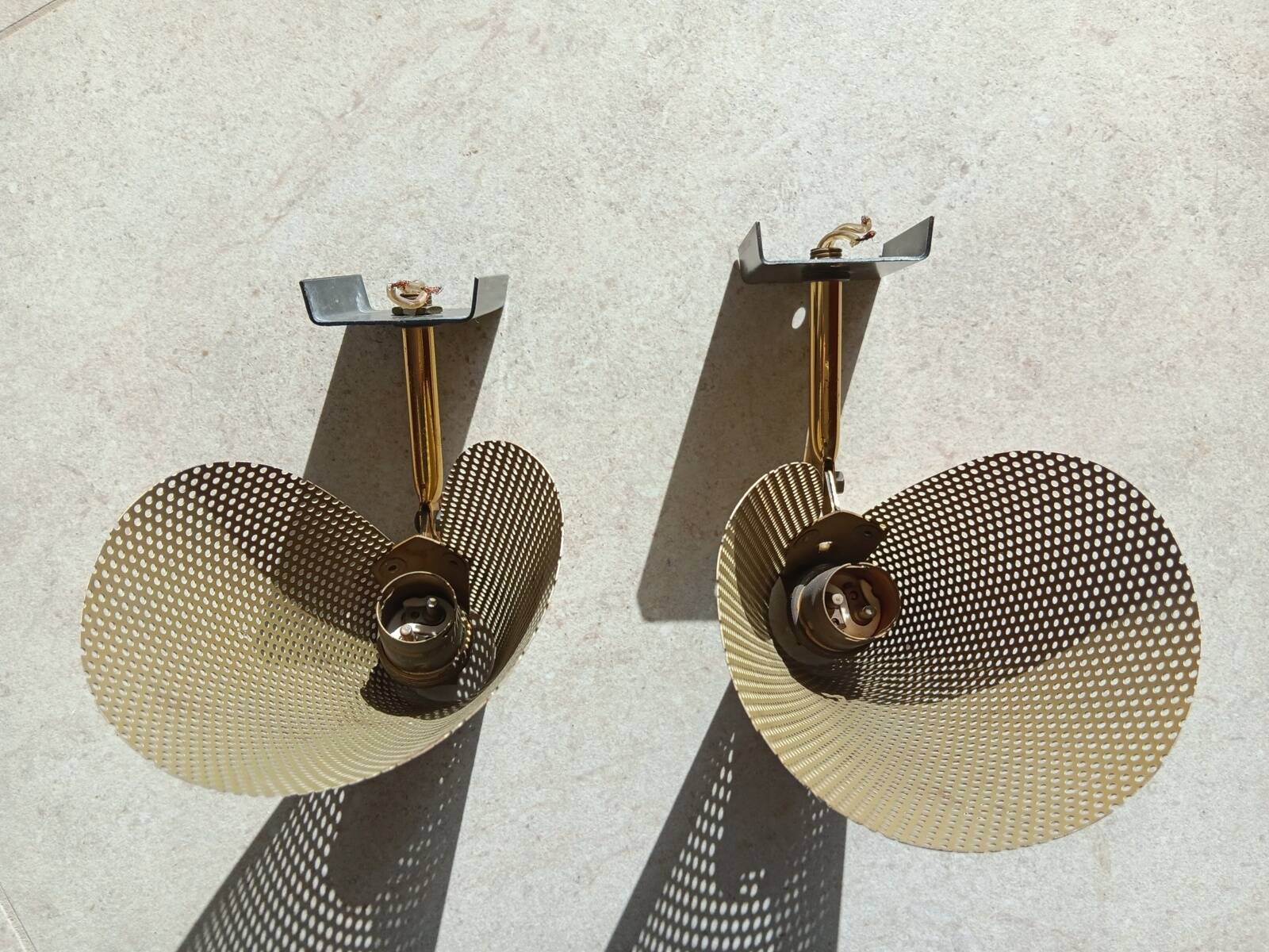 Pair of perforated metal horn wall lights