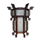 Asian wooden lantern carved with dragons and painted glass panels