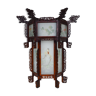 Asian wooden lantern carved with dragons and painted glass panels