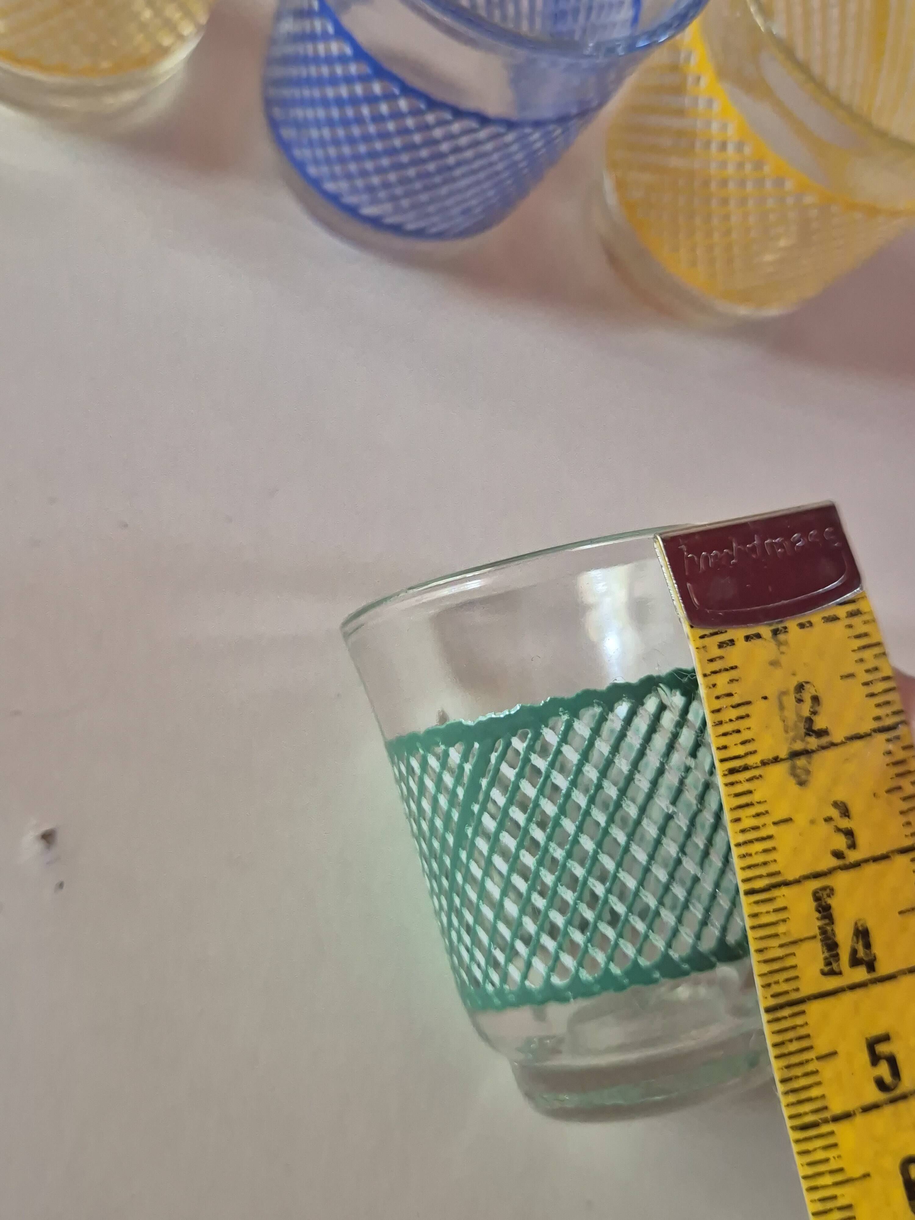 set of 4 vintage liqueur glasses in yellow, green, and blue