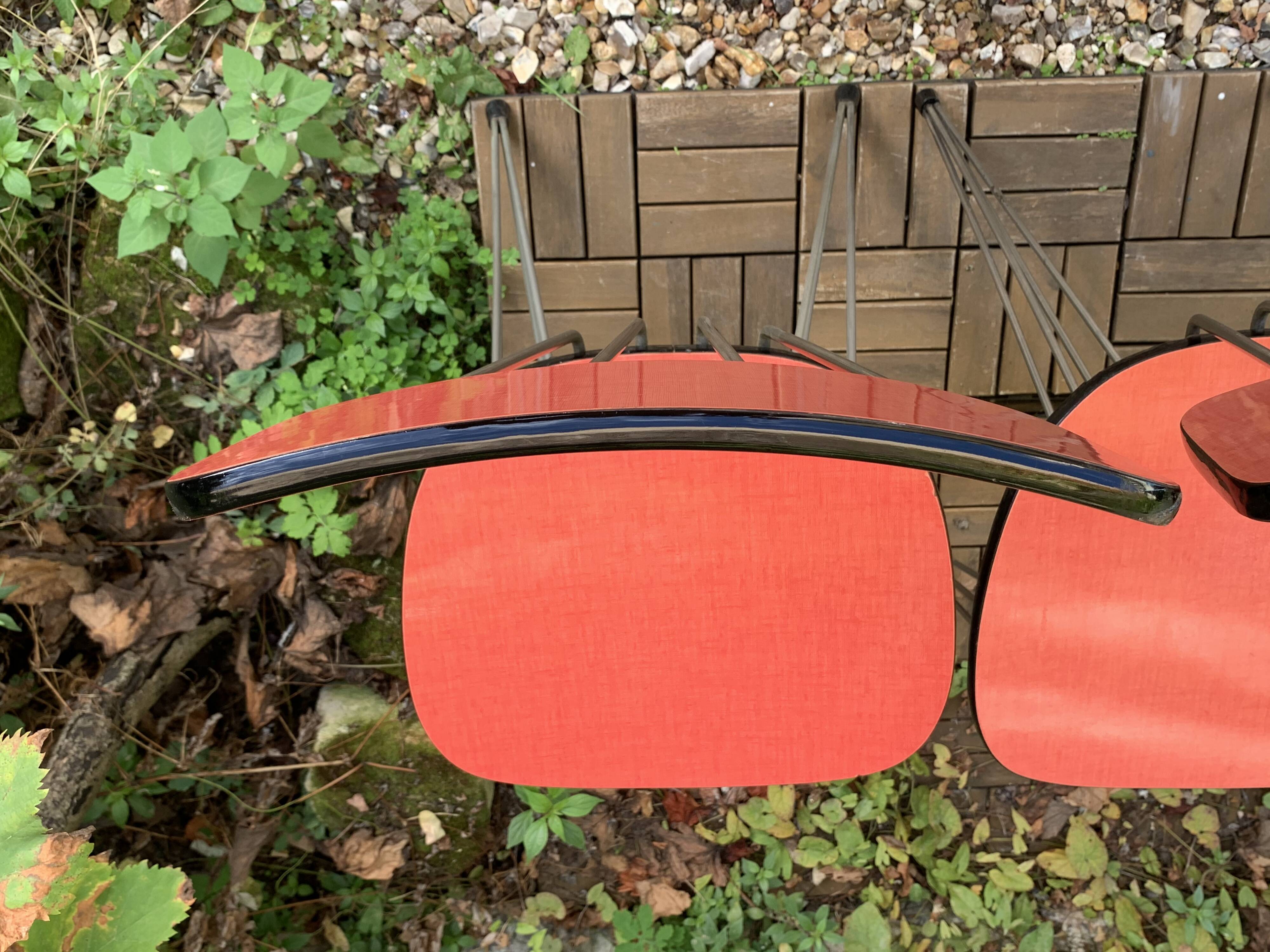 4 red Formica chairs with Eiffel legs, 1950s