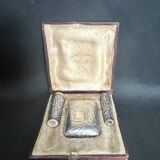 Art nouveau, silver metal smoking objects in case circa 1900