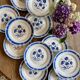 Set of 12 antique flat plates, blue flower decorations