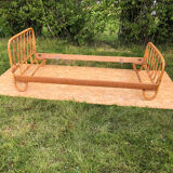 Rattan bed.