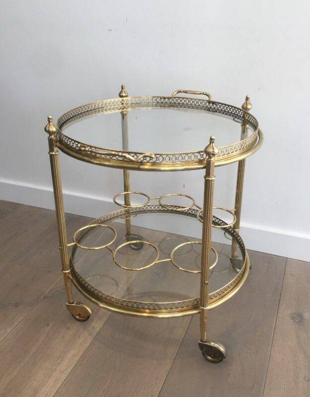 Round brass rolling table attributed to Maison Jansen