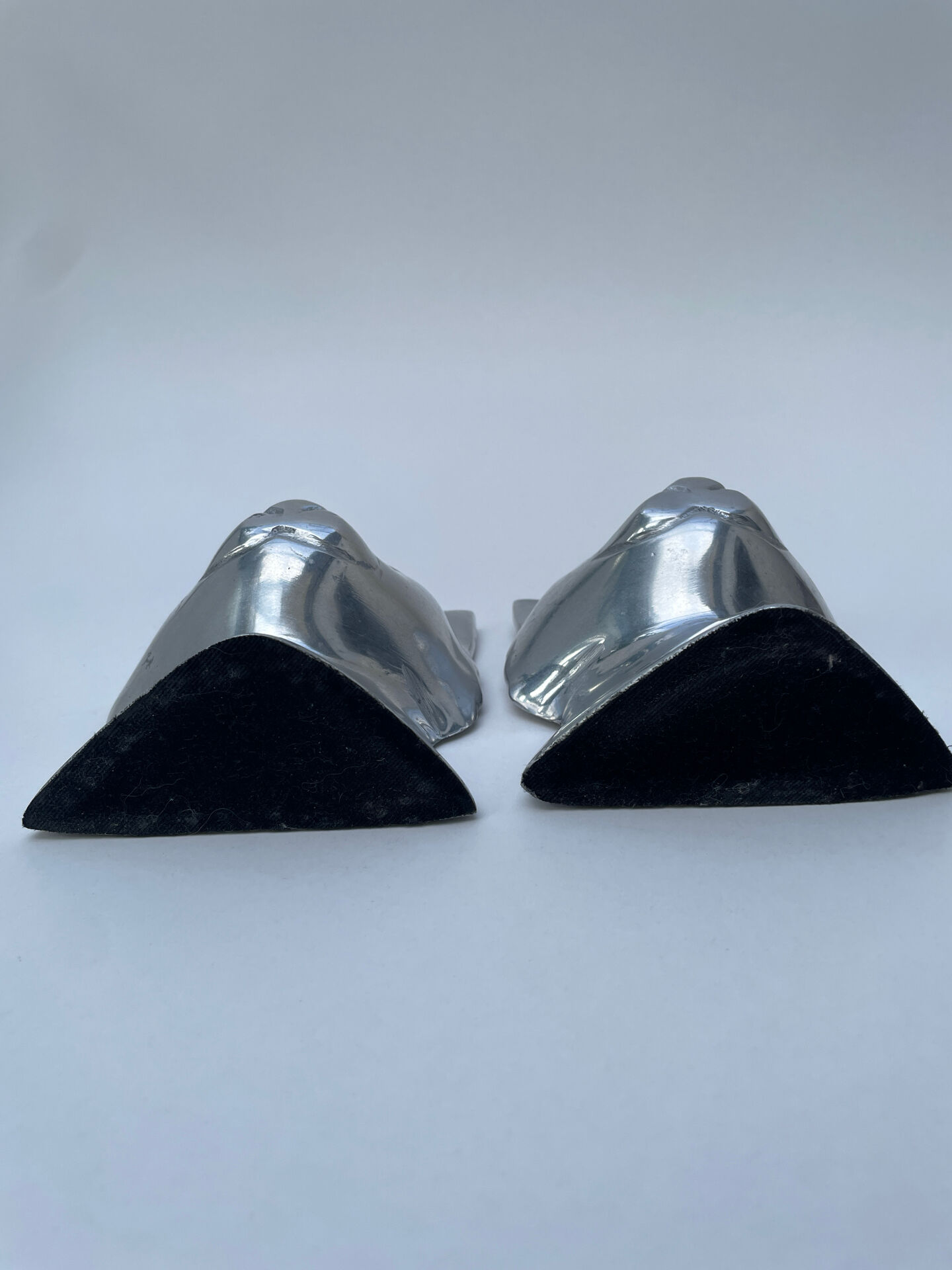Pair of designer cat head bookends